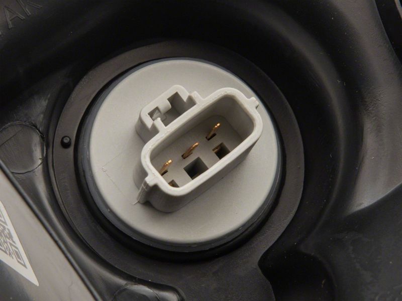 Raxiom 07-13 Toyota Tundra Axial Series Headlights w/ SEQL LED Bar- Black Housing (Clear Lens)