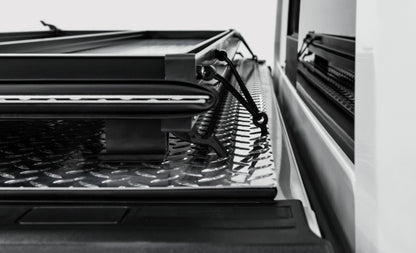 Access LOMAX 2022+ Rivian R1T 4ft 6in Bed (w/ OEM Tonneau Track) Folding Hard Cover - Black Urethane