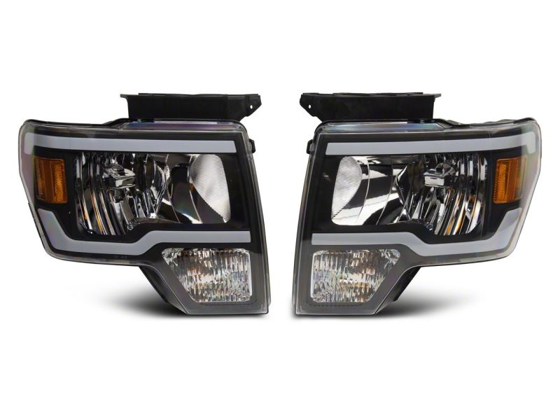 Raxiom 09-14 Ford F-150 Axial Series Headlight w/ SEQL LED Bar- Black Housing (Clear Lens)