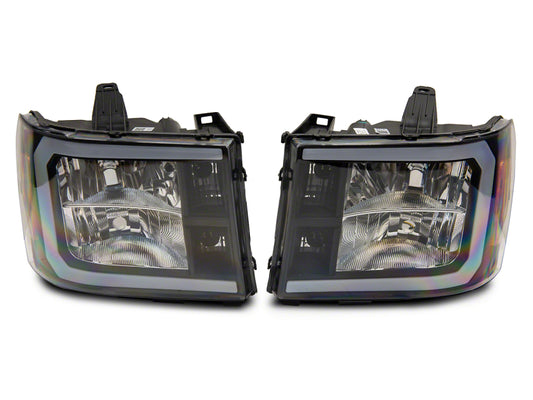 Raxiom 07-13 GMC Sierra 1500 Axial Series Headlights w/ LED Bar- Blk Housing (Clear Lens)