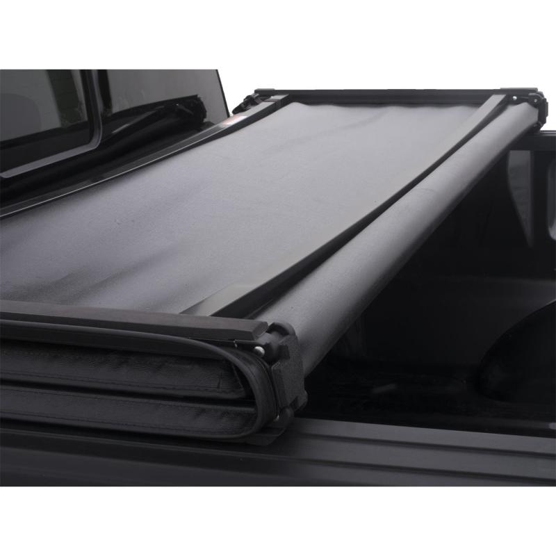 Lund 02-17 Dodge Ram 1500 (6.5ft. Bed Excl. Beds w/Rambox) Genesis Tri-Fold Tonneau Cover - Black
