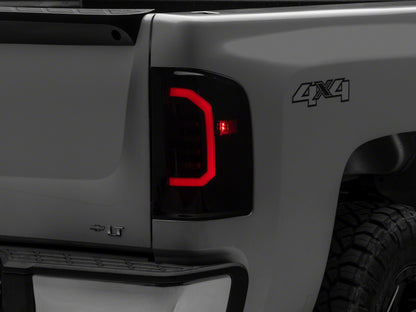 Raxiom 07-14 Chevrolet Silverado 1500 Axial Series LED Tail Lights- Black Housing (Smoked Lens)